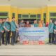 Kepala Kantor BPJS Ketenagakerjaan Cabang Padangsidimpuan Christian Natanael Sianturi (9 kanan), Asisten II Pemko Padangsidimpuan, Rahuddin Harahap dan dan Asisten III M.Ary Junaidi DP Lubis foto bersama saat penyerahan bantuan BPJS Ketenagakerjaan untuk korban banjir Padangsidimpuan, Kamis (20/3/2025). Waspada/ist.
