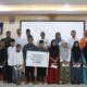 PARA anak yatim diabadikan bersama unsur menajemen usai menerima santunan. Waspada/Ist