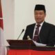 BUPATI Humbahas, Oloan Paniaran Nababan membacakan Nota Pengantar LKPj Tahun 2024 pada Rapat Paripurna DPRD. Waspada/Ist