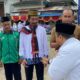 Ardi Yunus Siregar (tengah pakai selempang) dikonfirmasi wartawan lewat pesan WA, belum memberikan jawaban. (Waspada/Ist)