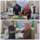 Kajari Langsa Efrianto, SH. MH bersama Direktur PT CMN Langsa Ernawati saat menandatangani MoU pendampingan hukum bidang perdata dan tata usaha negara, Jumat (25/4). Waspada/Munawar