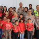 Kapolres Pematangsiantar AKBP Sah Udur Togi Marito Sitinjak (enam kanan baris kedua) pose bersama anak-anak PA dan lainnya saat mengunjungi PA Tabitha Care, Rabu (9/4) siang (Waspada-Ist).