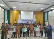 Bupati Agara Serahkan Kartu BPJamsostek Dan Sembako Gratis