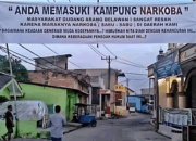 Spanduk Berisikan “Anda Memasuki Kampung Narkoba” Muncul Di Belawan