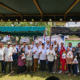 Pengurus DPW Partai Perindo Sumut dan pengurus DPD Perindo Kota Medan foto bersama dengan masyarakat penerima paket daging