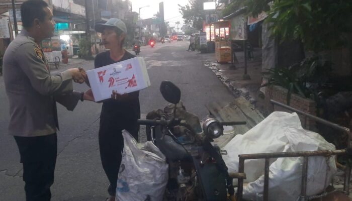 Sambut Hari Bhayangkara Polres P.Siantar Bagikan Bansos