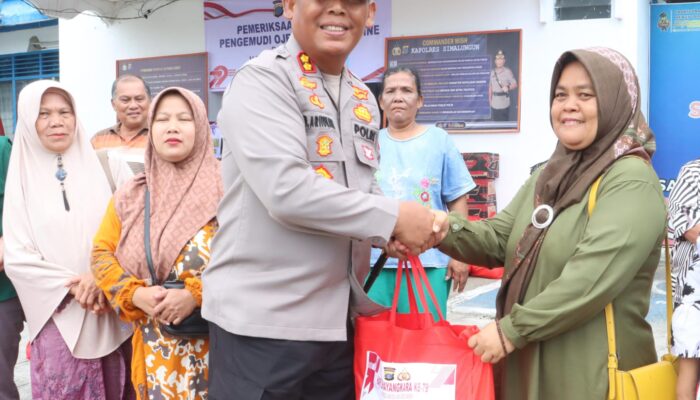 Polres Simalungun Bagikan 150 Paket Sembako Rayakan HUT Ke-79 Bhayangkara