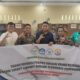 Tim LPPM UNIMED foto bersama usai melaksanakan kegiatan pengabdian kepada masyarakat Digitalisasi Perpustakaan Di SMK Negeri 1 Percut Sei Tuan. Waspada/Ist