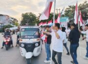 PKB Bagikan Ribuan Bendera Merah Putih Dan BBM Gratis Untuk Ojol