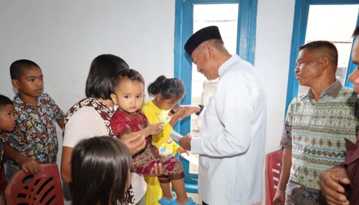Bupati Madina Serahkan Tali Asih Kepada Anak Yatim Di Simanondong