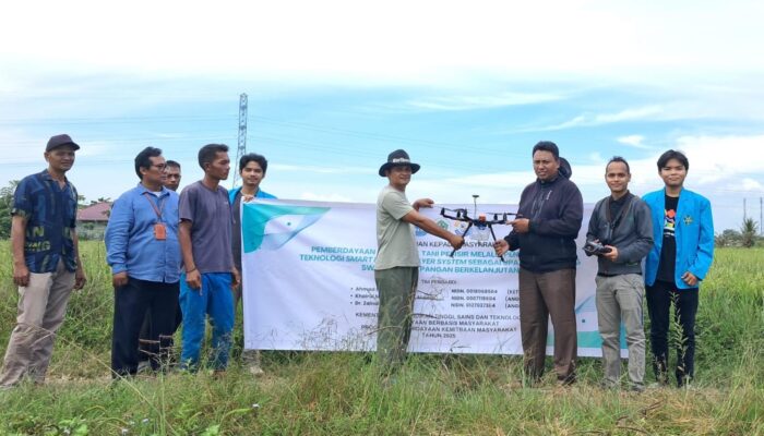 Tim PKM Unsam Kembangkan Teknologi Smart Drone Sprayer System Ke Petani Padi Di Aceh Tamiang