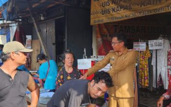 Camat Delitua-Tim Gabungan Tertibkan Dan Relokasi 156 Pedagang Tradisional