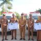 Bupati Paluta Serahkan Ambulans Percepat Pelayanan Kesehatan