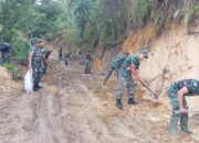Satgas TMMD Ke-126 Dan Warga Gotong Royong Bersihkan Jalan Baru