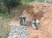 Antisipasi Longsor, Satgas TMMD Rampungkan Beronjong Di Desa Reje Guru