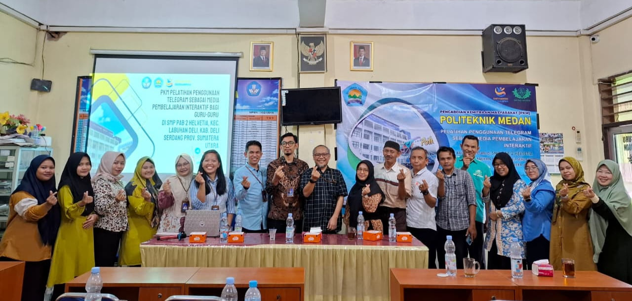 Dosen Polmed Latih Guru SMP PAB 2 Helvetia Gunakan Telegram Sebagai Media Pembelajaran Interaktif