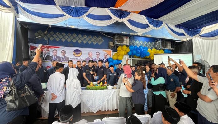 Rayakan HUT Ke 14, DPD Nasdem Medan Bagikan 100 Paket Bansos