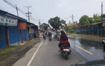 Jalan Lintas P.Brandan Mulai Pulih Dari Genangan Banjir