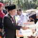 Bupati Padanglawas Serahkan Bantuan Rp425,5 Juta Untuk Korban Bencana