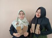 Papan Biokomposit Ramah Lingkungan Dari Limbah Pelepah Sawit Dan Cangkang Kerang Bulu