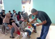 Keluarga Besar H. Ashari Tambunan Berikan Sedekah Kepada Anak Yatim dan Dhuafa di Pantai Labu