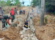 Satgas TMMD Ke-127 Lanjutkan Pembuatan Drainase Di Nagori Bahapal