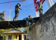 Satgas Gulbencal Kodam I/BB Rampungkan Perehaban Jembatan Gantung Penghubung Desa