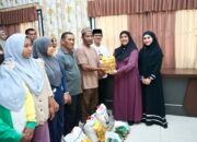 Ketua TP PKK Langkat Ny Endang Syah Afandin Salurkan 50 Paket Sembako Untuk Dhuafa Dan Anak Yatim