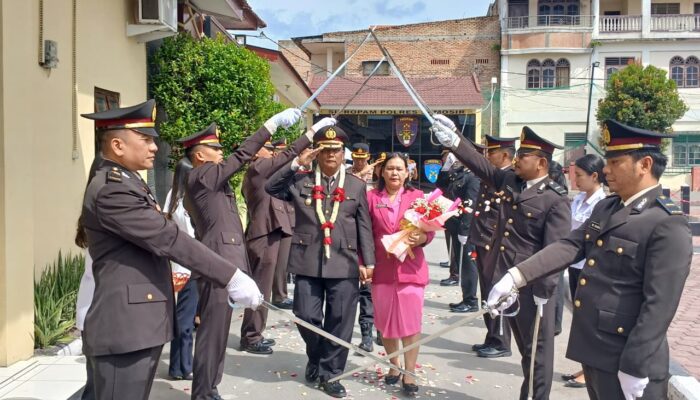 Purna Bhakti Kapolsek Onanrunggu Kompol Marlan Silalahi
